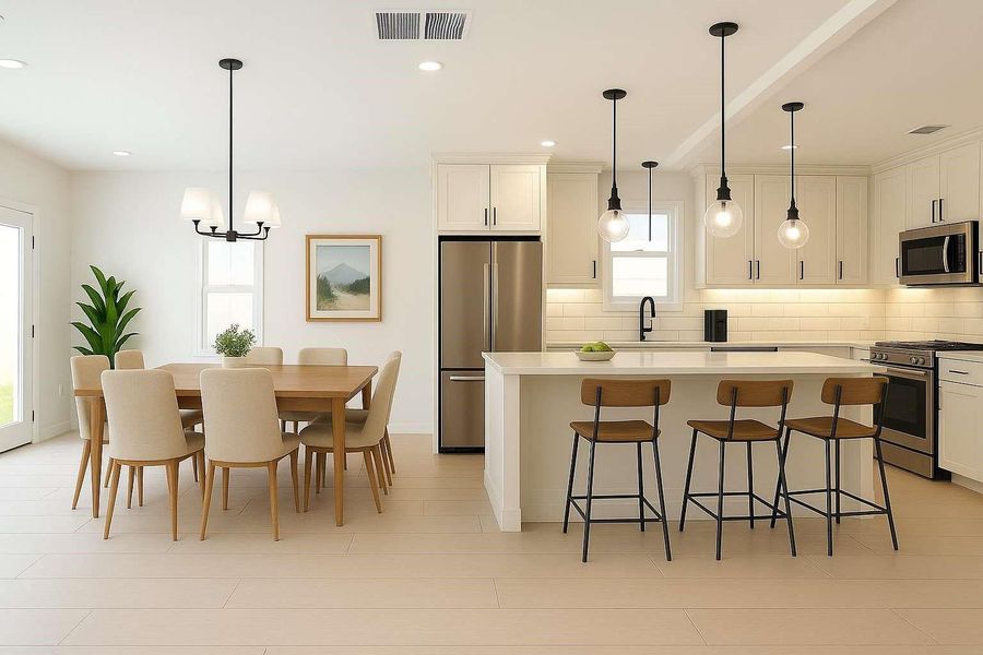 Staged-Kitchen and Dining area over looking the covered patio