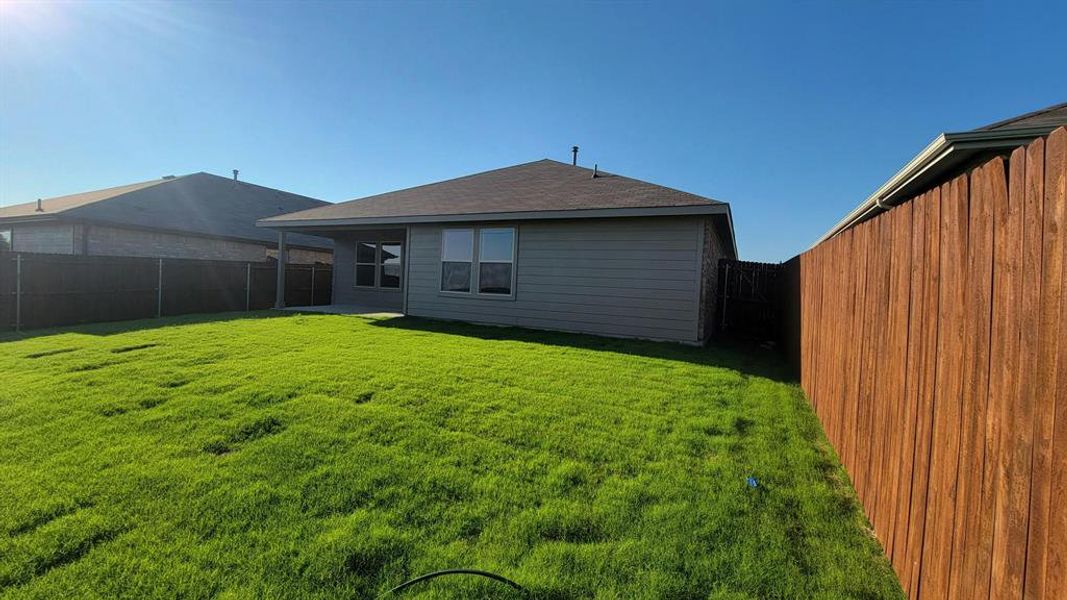 Front exterior of a new home in Highlands at Chapel Creek, Fort Worth, TX, highlighting curb appeal (Image 13). Front exterior of a new home in Highlands at Chapel Creek, Fort Worth, TX, highlighting curb appeal (Image 13).