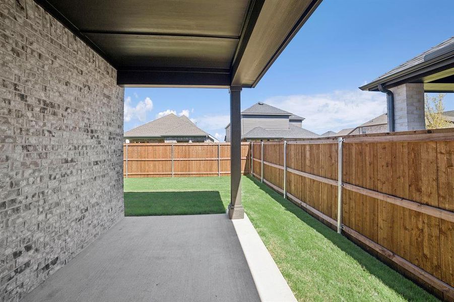 Exterior details and patio area of a home in Creekshaw – Gardens, Royse City (Image 2).
