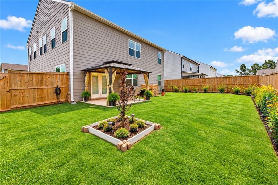 Exterior details and patio area of a home in Bailey Glynn, Covington (Image 3).