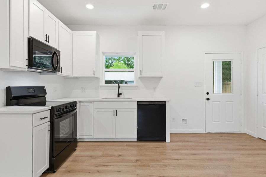 Modern kitchen with granite countertops