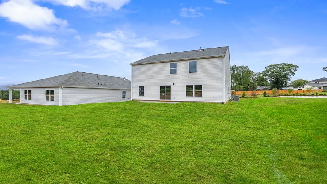 Exterior details and patio area of a home in Bentley Park, Greenwood (Image 4). Exterior details and patio area of a home in Bentley Park, Greenwood (Image 4).
