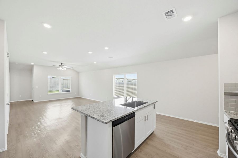 Large and wide windows shower the room in natural light.