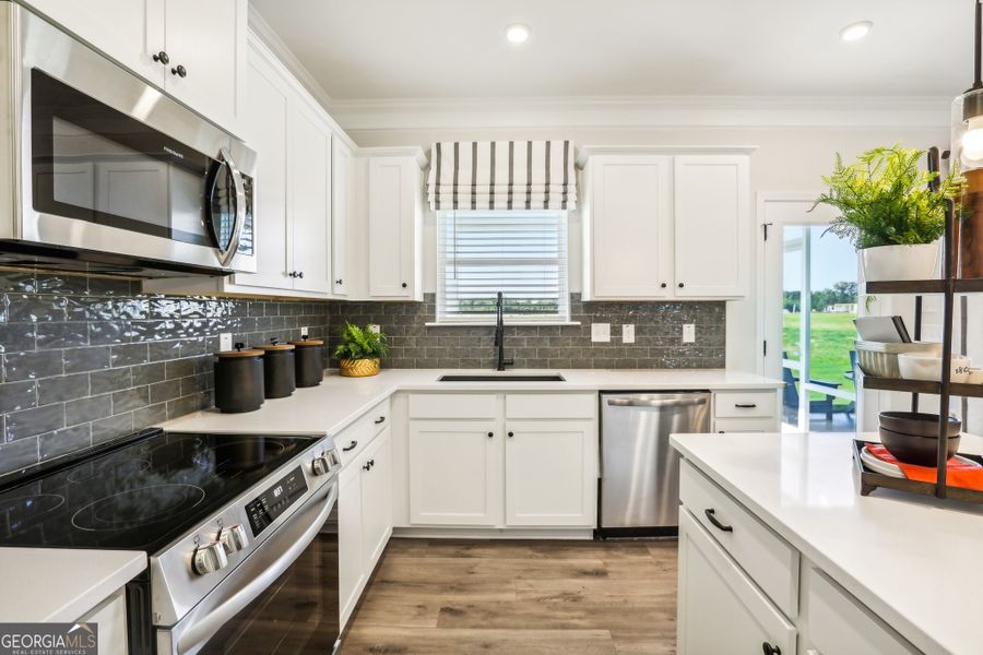 Furnished interior view inside a new home in Maddox Station, Eatonton (Image 10).