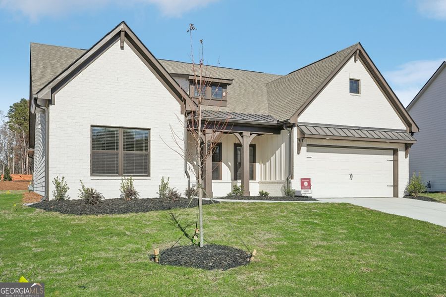 Front exterior of a new home in Summerlin, Winder, GA, highlighting curb appeal (Image 26).