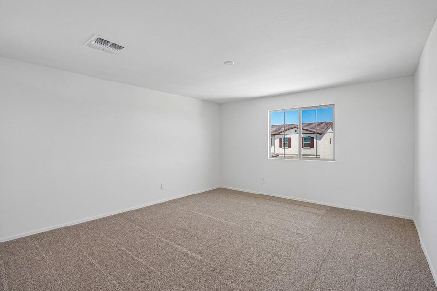 Spacious, unfurnished interior of a new home in Bella Camino Traditions, San Tan Valley (Image 13).