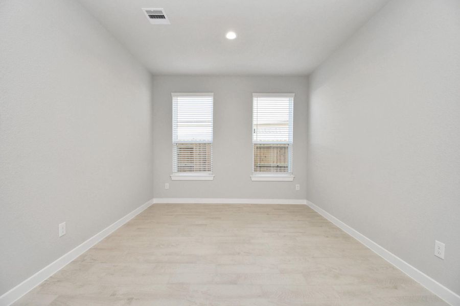Make memories gathered around the table with your family and friends! This spacious diningroom features elegant flooring, custom paint, and adjacent to the kitchen for open concept feel. Sample photo of completed home with similar floor plan. Actual colors and selections may vary.