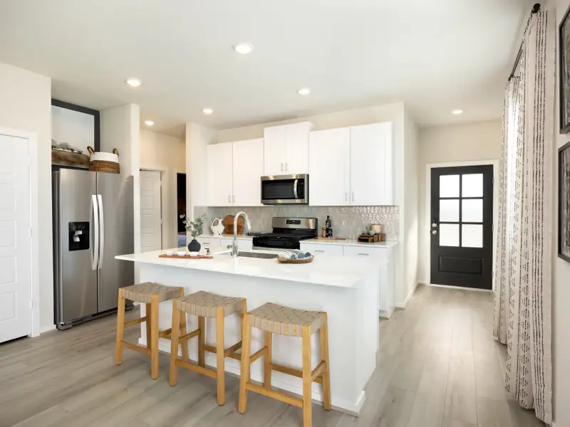 Furnished interior view inside a new home in Sanford Farms - Traditional Series, Waller (Image 3).
