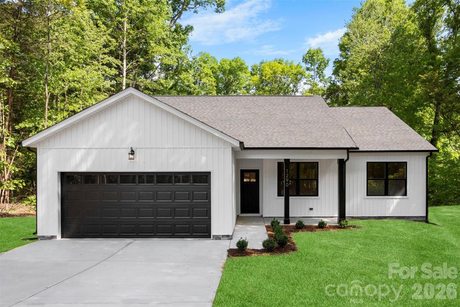 Front exterior of a new home in , Statesville, NC, highlighting curb appeal (Image 28).