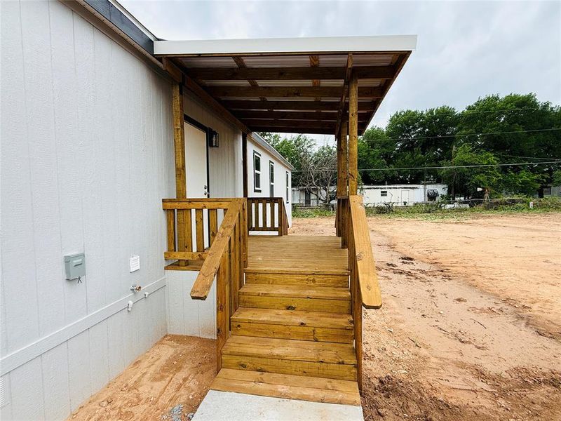 Exterior details and patio area of a home in , Granbury (Image 18).