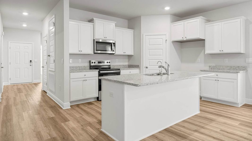 Furnished interior view inside a new home in Pine Creek and Heron Walk, Port Saint Joe (Image 7). Furnished interior view inside a new home in Pine Creek and Heron Walk, Port Saint Joe (Image 7).