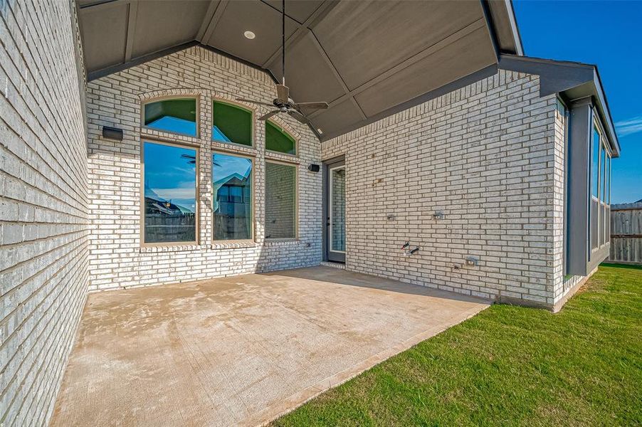 A Texas-sized covered patio equipped with gas connections for a future outdoor kitchen.