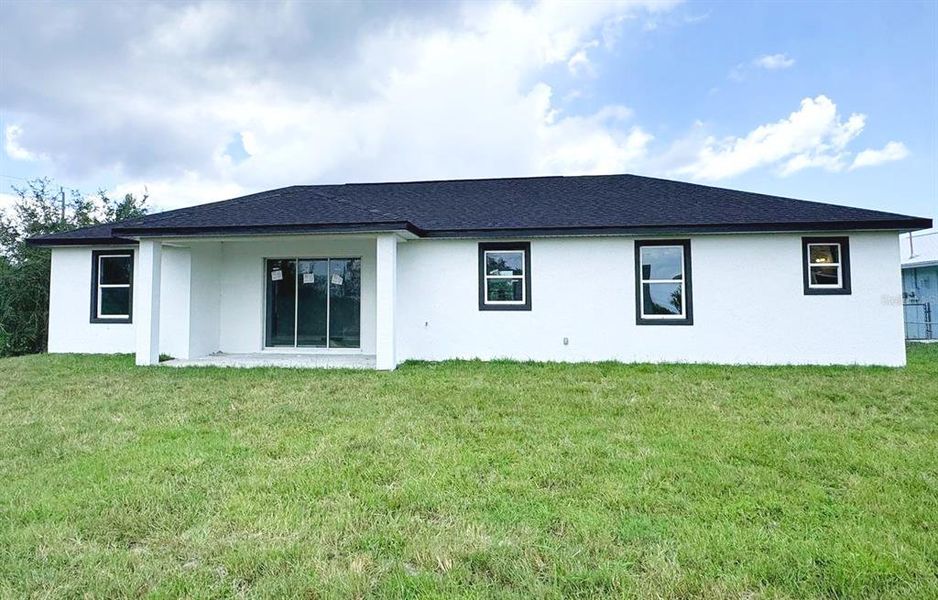 Exterior details and patio area of a home in , Port Charlotte (Image 2). Exterior details and patio area of a home in , Port Charlotte (Image 2).