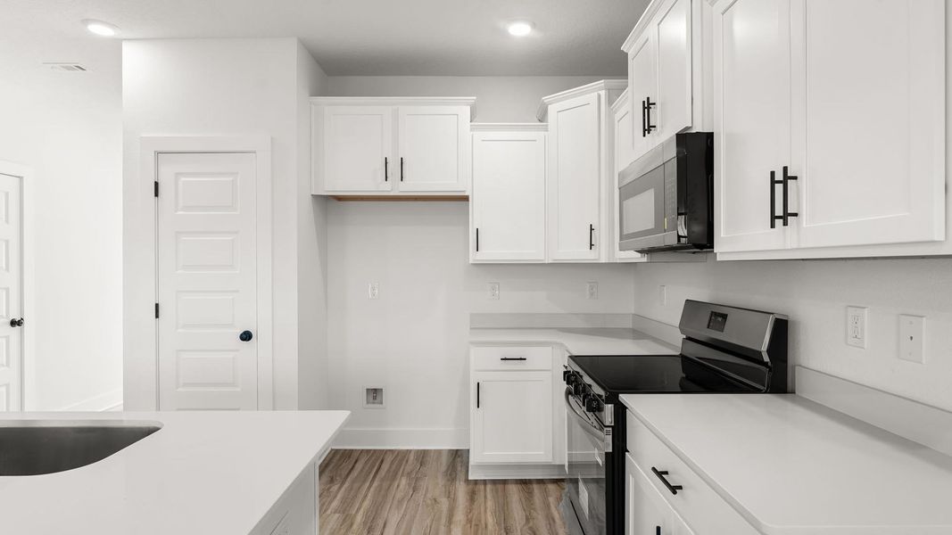 Furnished interior view inside a new home in Colonial East Townhomes, Panama City Beach (Image 9).