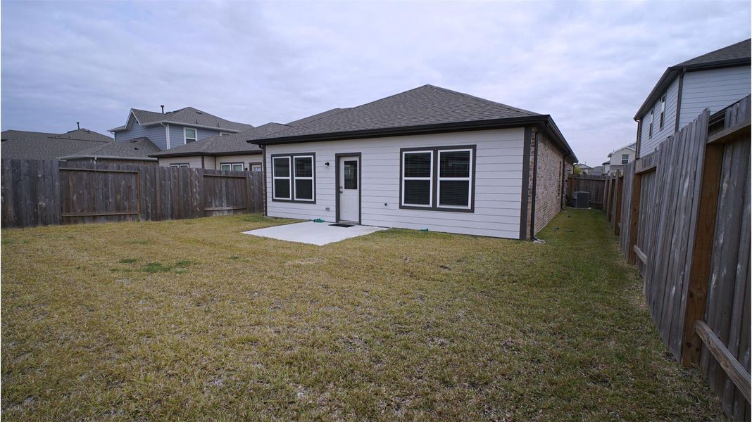 Exterior details and patio area of a home in Lonestar Collection at Aurora, Katy (Image 3).