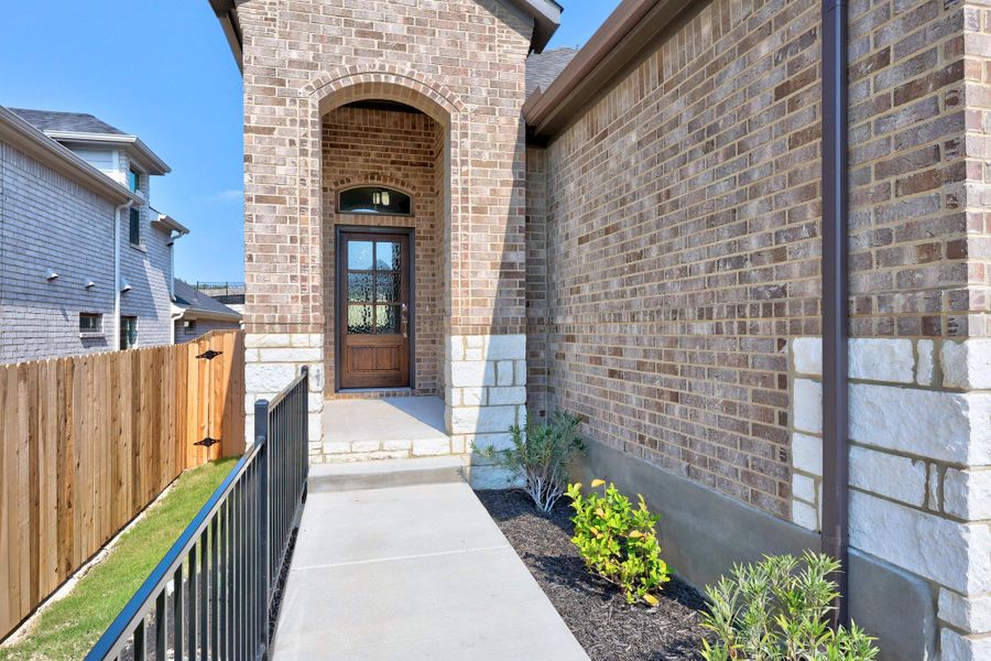 Exterior details and patio area of a home in Lakeside at Tessera, Lago Vista (Image 3).