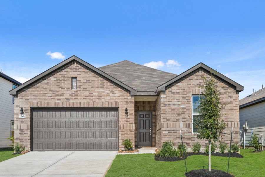 Front exterior of a new home in Lexington Heights, Willis, TX, highlighting curb appeal (Image 2).