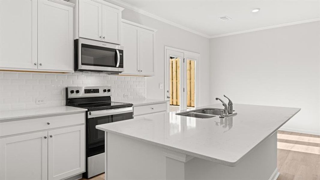 Furnished interior view inside a new home in Waypoint, Flowery Branch (Image 8).
