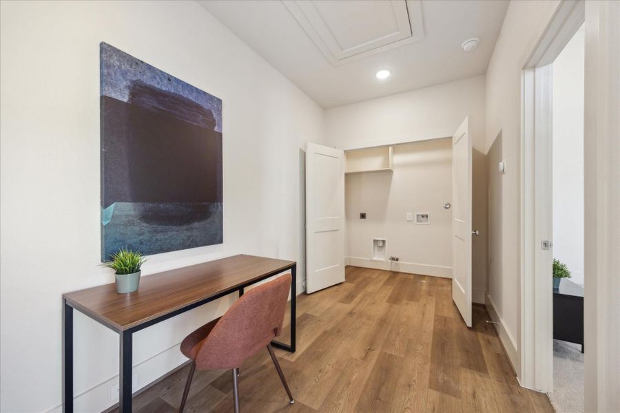 Tucked away just off the main hallway, it provides a quiet, focused environment while maintaining easy access to nearby bedrooms and storage.