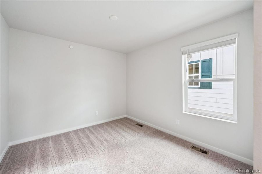 Spacious, unfurnished interior of a new home in Legato, Commerce City (Image 20).