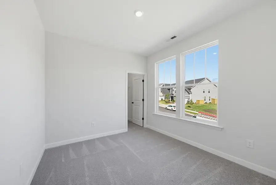Spacious, unfurnished interior of a new home in Sweetbrier, Durham (Image 32).