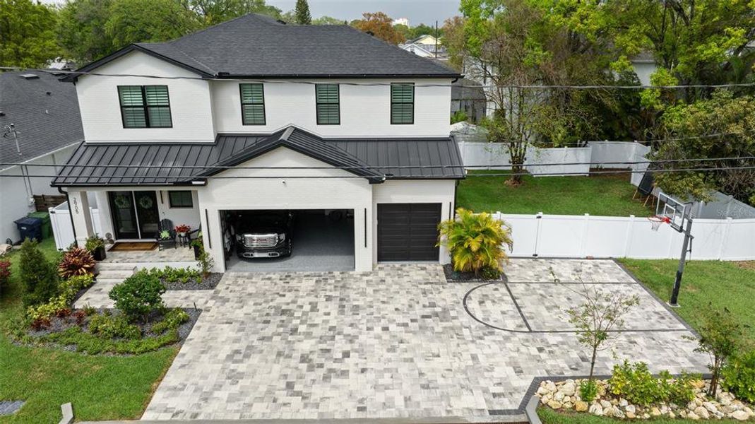 Front exterior of a new home in , Tampa, FL, highlighting curb appeal (Image 26).