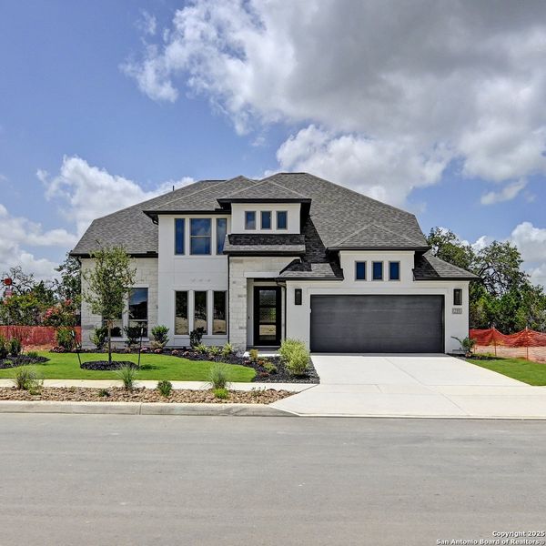 Front exterior of a new home in Esperanza 60', Boerne, TX, highlighting curb appeal (Image 22). Front exterior of a new home in Esperanza 60', Boerne, TX, highlighting curb appeal (Image 22).