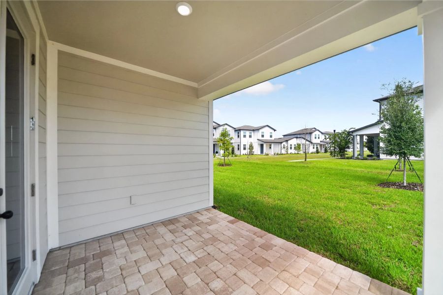 Exterior details and patio area of a home in Northlake at Ovation, Winter Garden (Image 20). Exterior details and patio area of a home in Northlake at Ovation, Winter Garden (Image 20).
