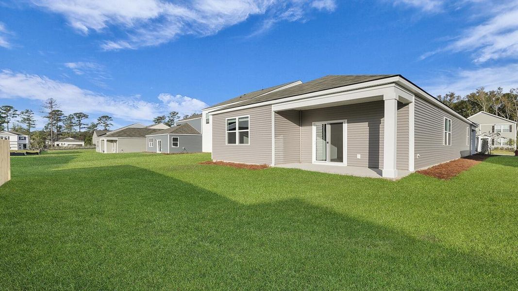 Exterior details and patio area of a home in Pine Hills at Cane Bay, Summerville (Image 24). Exterior details and patio area of a home in Pine Hills at Cane Bay, Summerville (Image 24).