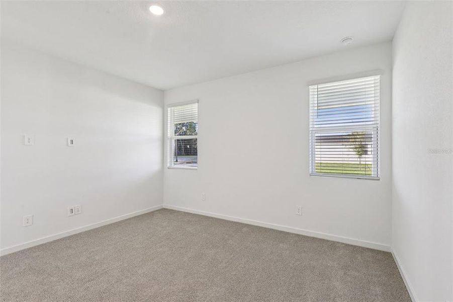 Spacious, unfurnished interior of a new home in Colbert Landings, Palm Coast (Image 22).