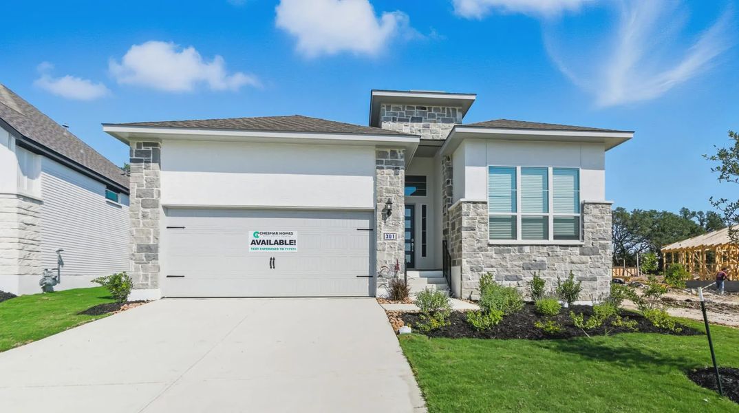 Representative exterior photo of a completed home built from the Hampton by Chesmar Homes in Buffalo Crossing, Rosenberg, TX (Image 1). Representative exterior photo of a completed home built from the Hampton by Chesmar Homes in Buffalo Crossing, Rosenberg, TX (Image 1).