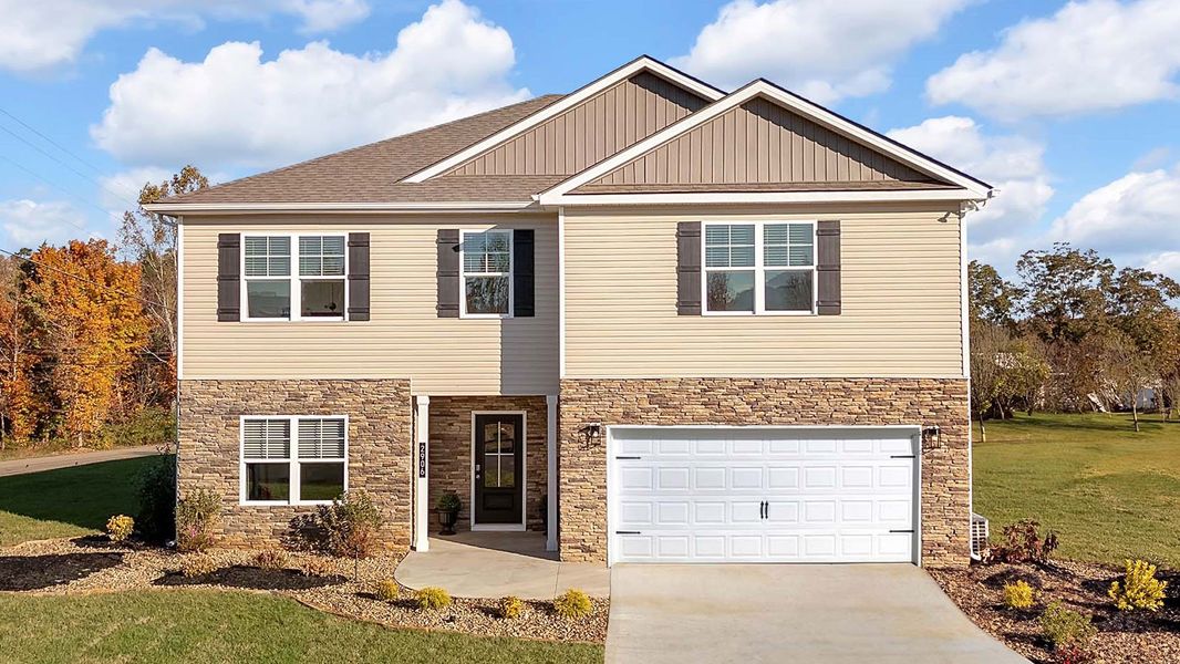 Representative exterior photo of a completed home built from the Green by D.R. Horton in Whispering Springs, Maryville, TN (Image 1). Representative exterior photo of a completed home built from the Green by D.R. Horton in Whispering Springs, Maryville, TN (Image 1).