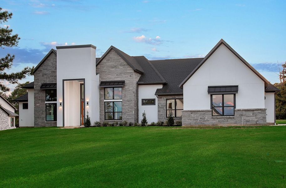 Front exterior of a new home in , Montgomery, TX, highlighting curb appeal (Image 2). Front exterior of a new home in , Montgomery, TX, highlighting curb appeal (Image 2).