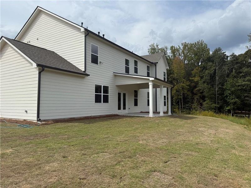 Exterior details and patio area of a home in Rosewood Lake Estates, Hoschton (Image 19). Exterior details and patio area of a home in Rosewood Lake Estates, Hoschton (Image 19).
