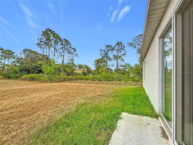 Exterior details and patio area of a home in , Port Charlotte (Image 25).
