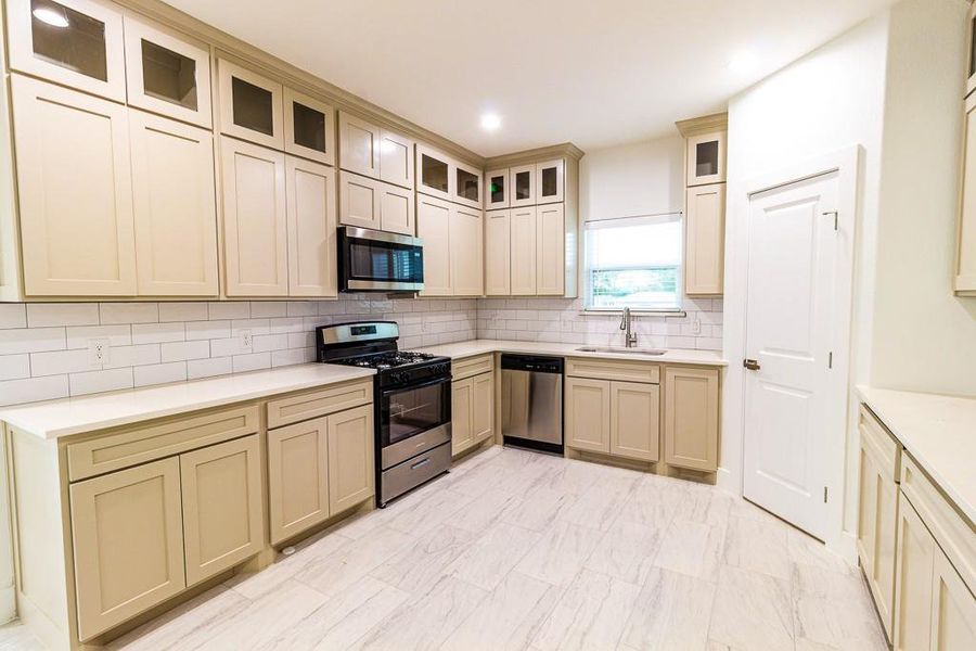 Kitchen with stainless steel appliances and gas stove Kitchen with stainless steel appliances and gas stove