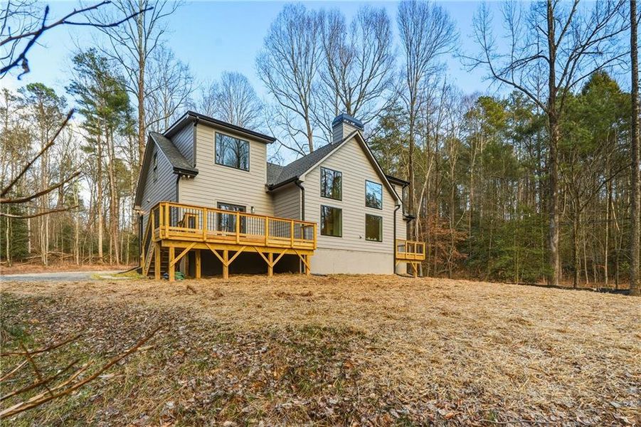 Exterior details and patio area of a home in , Ellijay (Image 30).