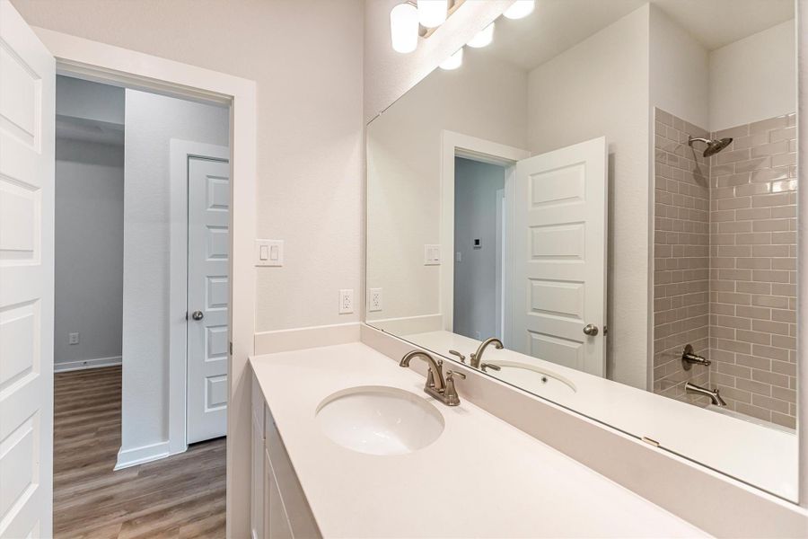 Furnished interior view inside a new home in Deer Pines, Conroe (Image 13).