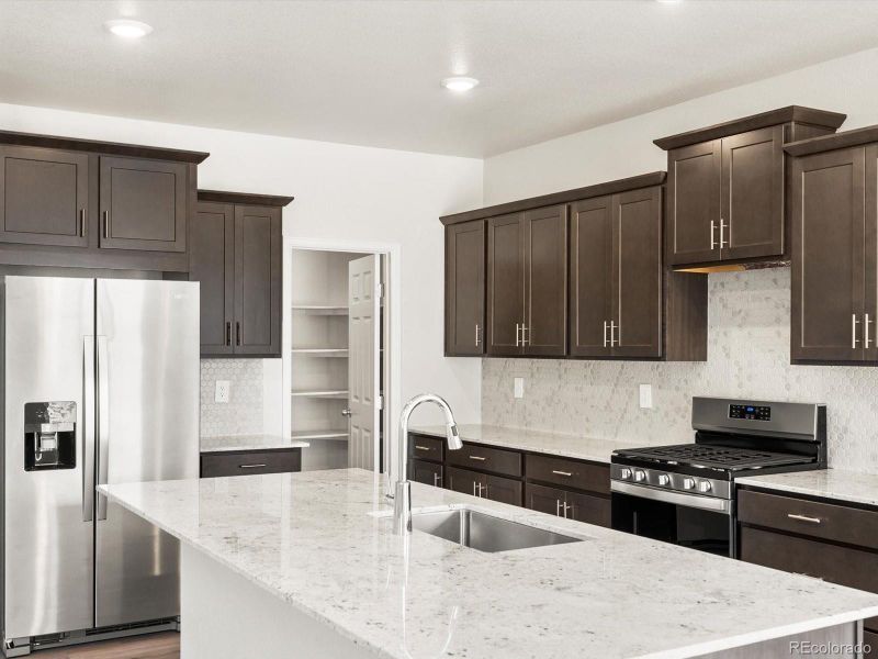 Furnished interior view inside a new home in Poudre Heights: The Alpine Collection, Windsor (Image 6).