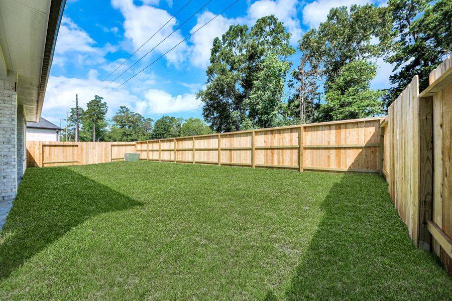Backyard retreat, offering an abundance of space for kids to play and explore. The possibilities are endless in this outdoor haven, where the joy of open-air activities and family gatherings awaits.
