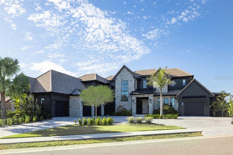 Front exterior of a new home in , Orlando, FL, highlighting curb appeal (Image 26).