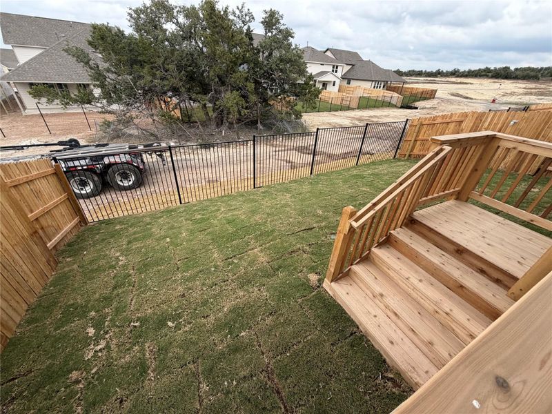 Exterior details and patio area of a home in Cannon Ranch 40s, Dripping Springs (Image 16).