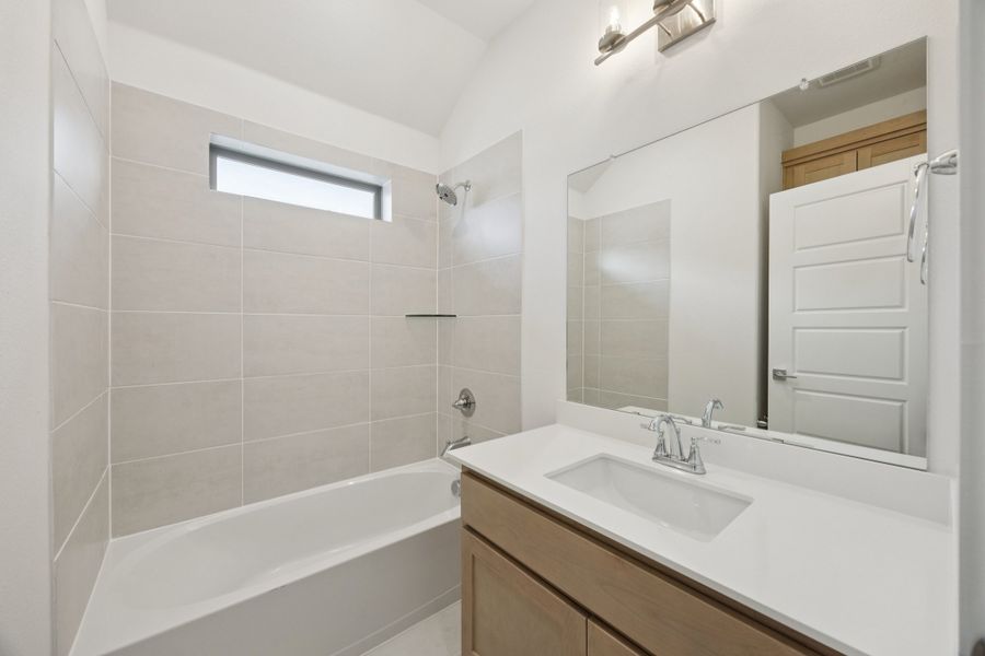 Bathroom in the Monet II home plan by Trophy Signature Homes – REPRESENTATIVE PHOTO Bathroom in the Monet II home plan by Trophy Signature Homes – REPRESENTATIVE PHOTO