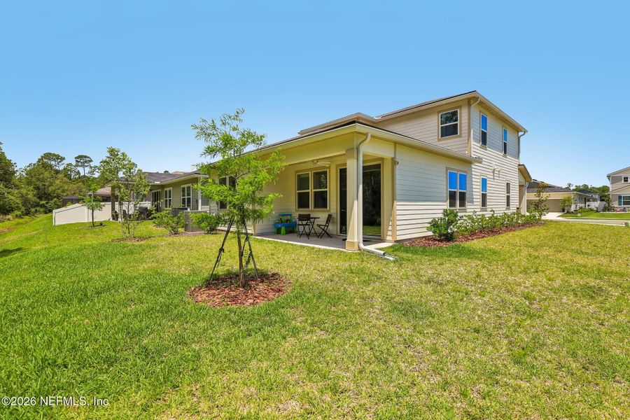 Exterior details and patio area of a home in Seasons at Morada, St. Augustine (Image 25).
