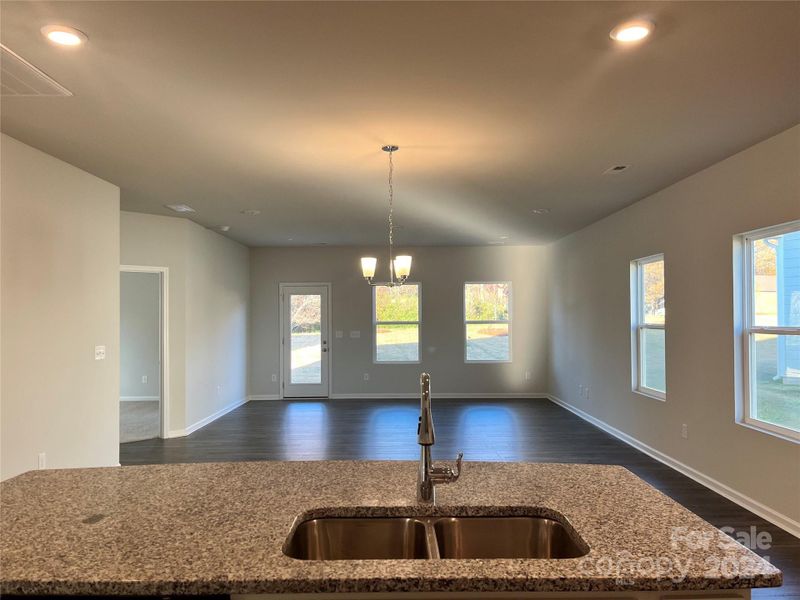 Open concept kitchen, casual dining an family room