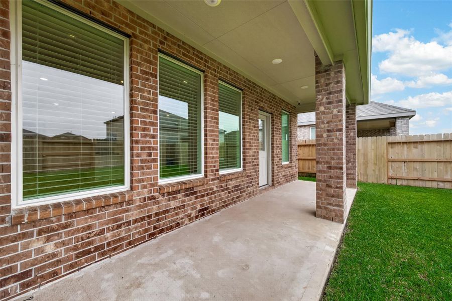 Huge covered patio ready for game days, weekend BBQs, and relaxing evenings outdoors with plenty of space to entertain year-round.