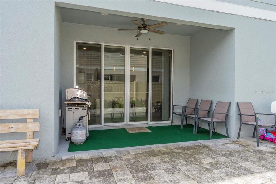 Exterior details and patio area of a home in Urban Collection at Big Sky, Kissimmee (Image 4).