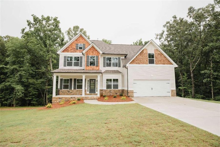 Front exterior of a new home in , Douglasville, GA, highlighting curb appeal (Image 30). Front exterior of a new home in , Douglasville, GA, highlighting curb appeal (Image 30).