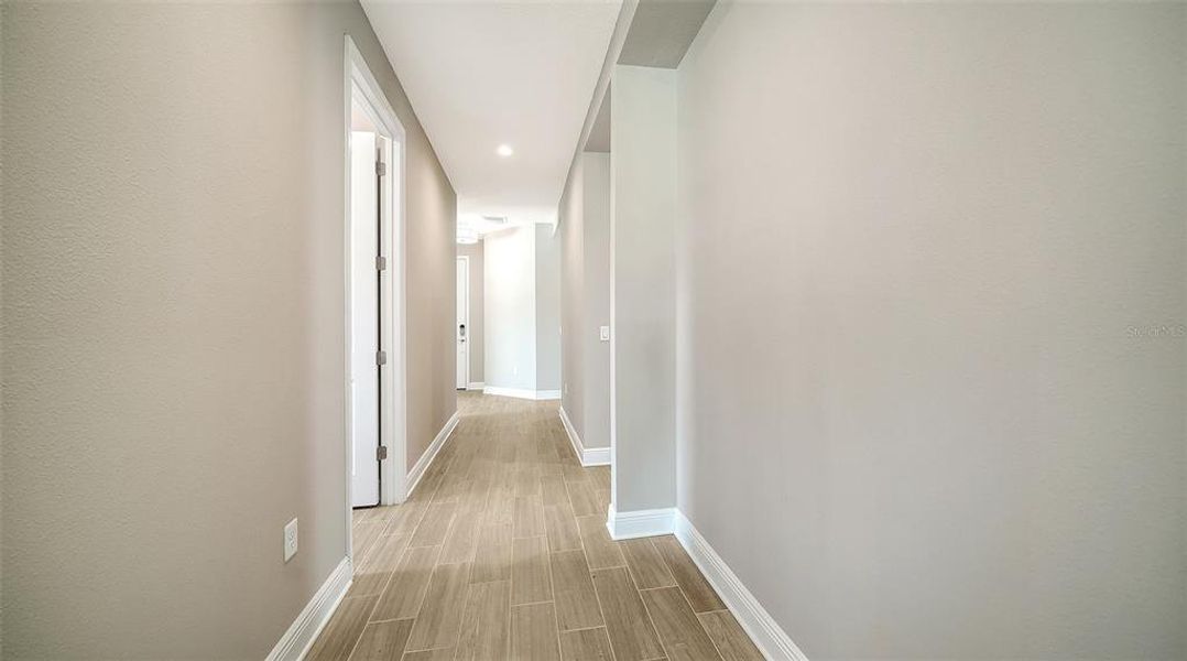 Spacious, unfurnished interior of a new home in Wildleaf at North River Ranch, Parrish (Image 21).