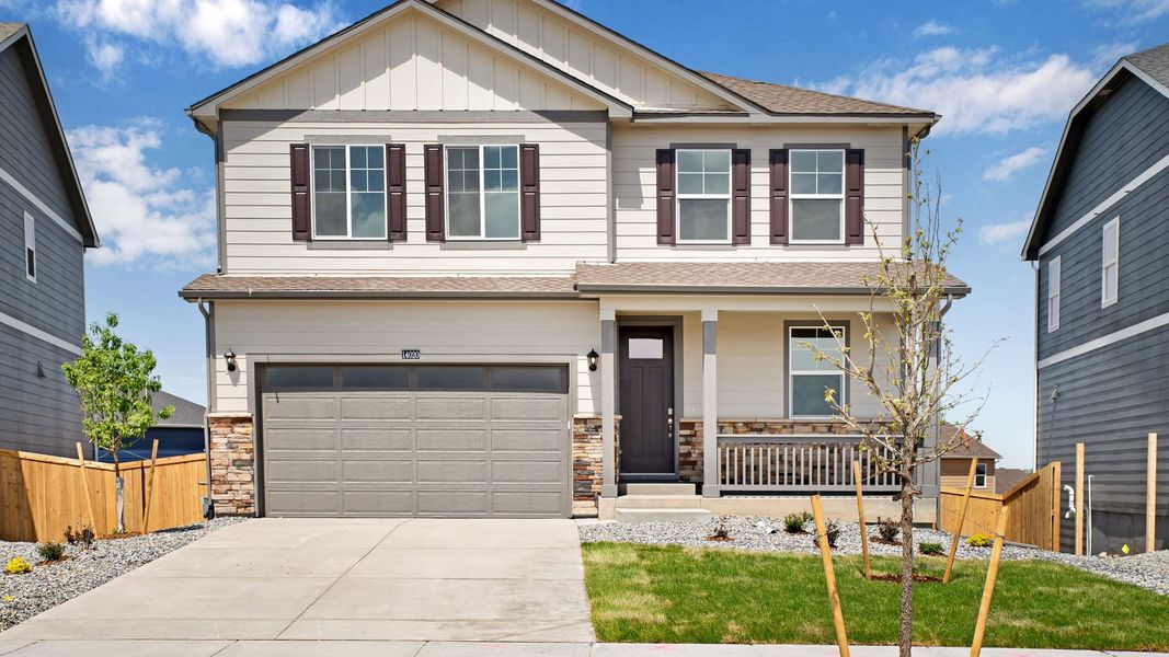 Front exterior of a new home in Trails at Crowfoot, Parker, CO, highlighting curb appeal (Image 1). Front exterior of a new home in Trails at Crowfoot, Parker, CO, highlighting curb appeal (Image 1).